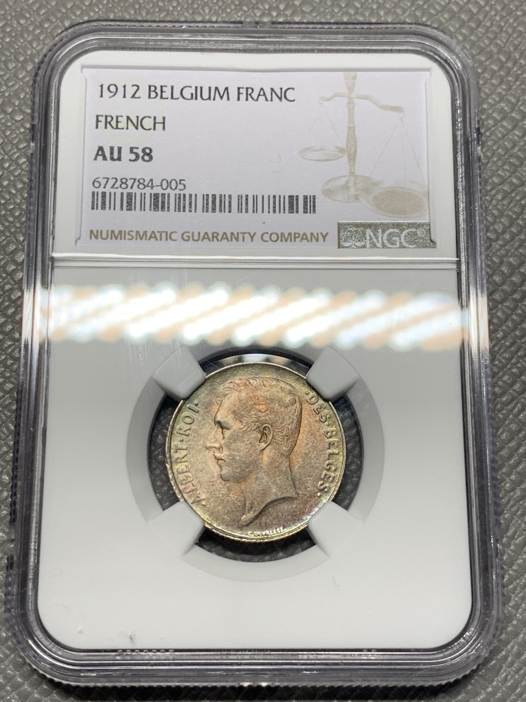 《竞宝斋》第143场-周日，周一 2场 (全场包邮) NGC-AU58 比利时1912年阿尔贝托国王 1法郎银币 五彩包浆非常漂亮