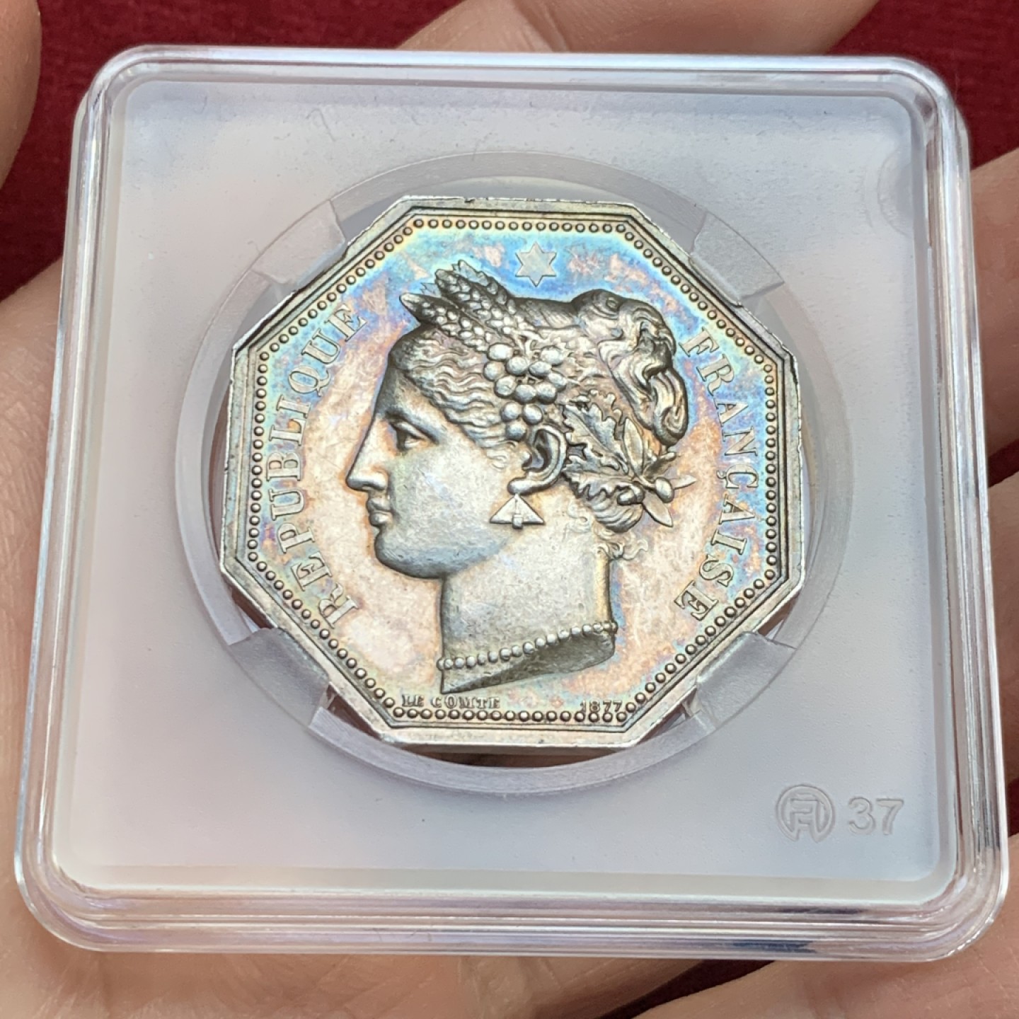 《竞宝斋》第143场-周日，周一 2场 (全场包邮) 法国 1880-1898 银质八角代币  鲁昂地区公证人 金紫包浆非常漂亮 个头很大 丰饶角边铭 22.3g 36.2mm