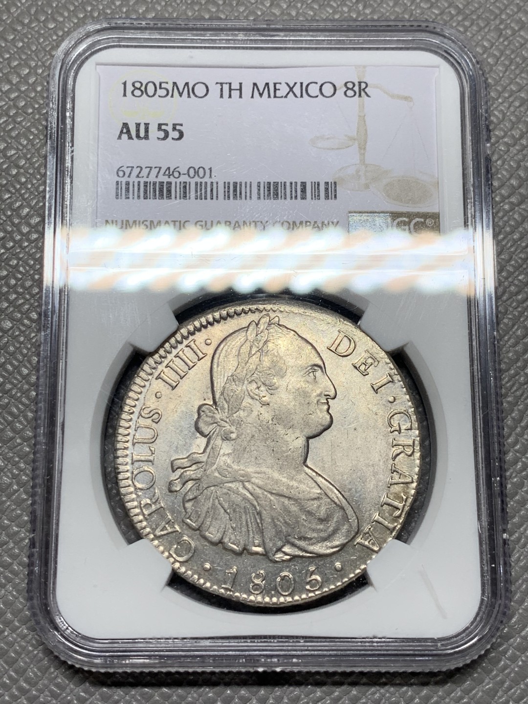 《竞宝斋》第143场-周日，周一 2场 (全场包邮) NGC AU55 墨西哥 1805年 卡四 双柱大银币 原味包浆 打制的非常好