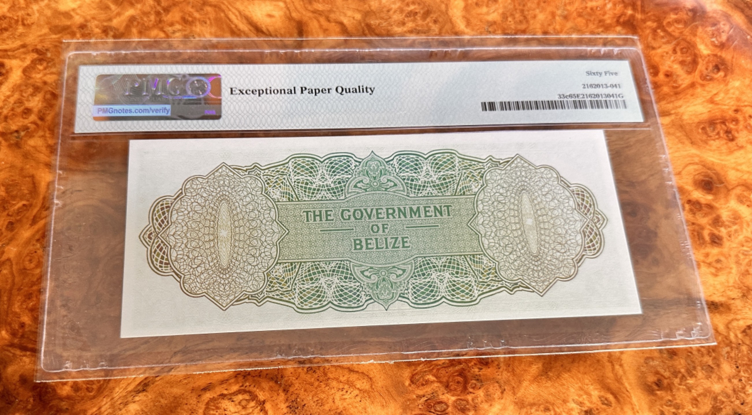 Chase Auction 第19期 - - 外钞、民国钞和人民币混合场！ 1976年伯利兹1元，PMG65，大冠女王！