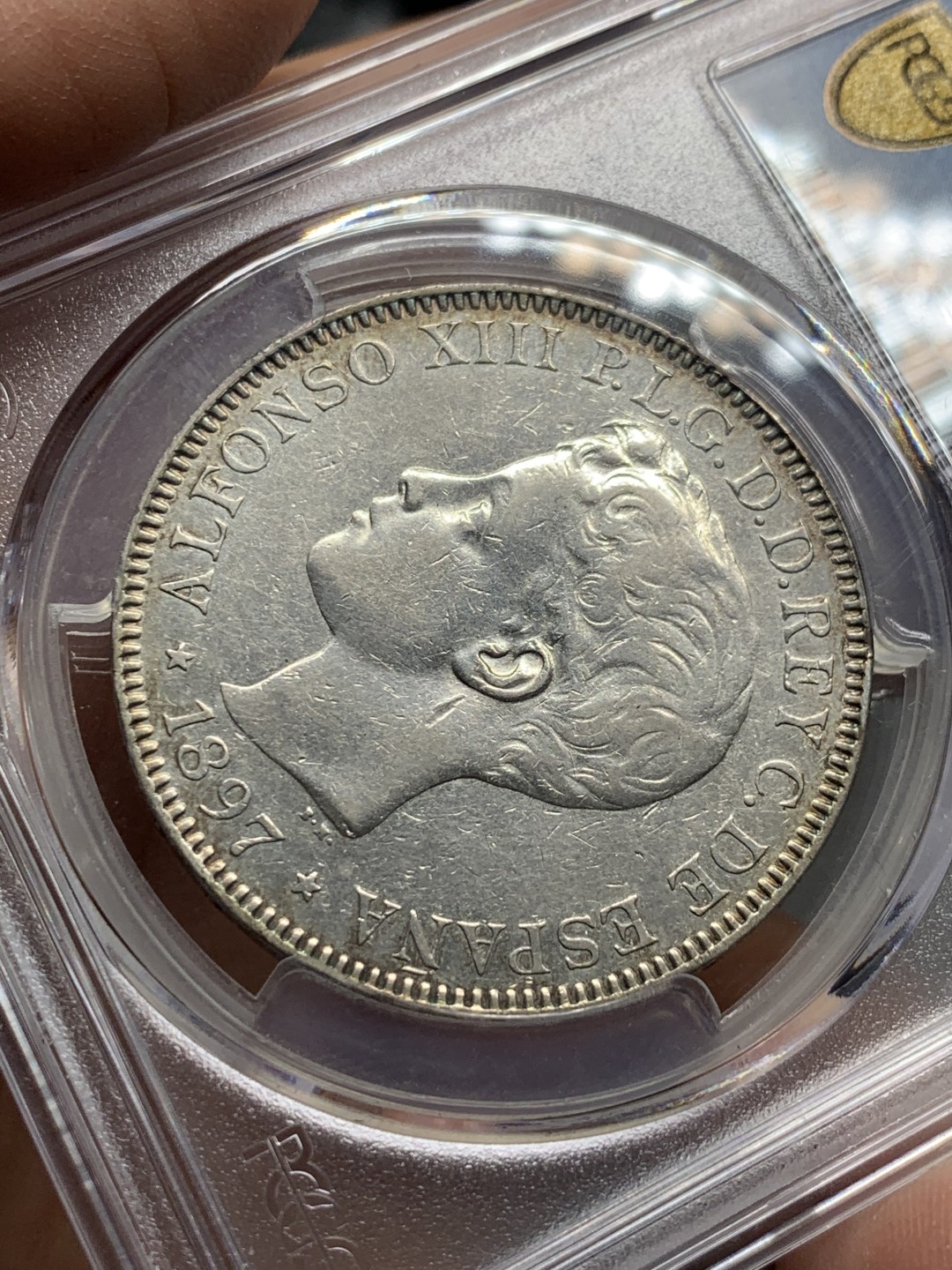 《竞宝斋》第143场-周日，周一 2场 (全场包邮) PCGS-AUD 西属菲律宾 1897年 阿方索十三世 1比索 银币 西属系列少见品种