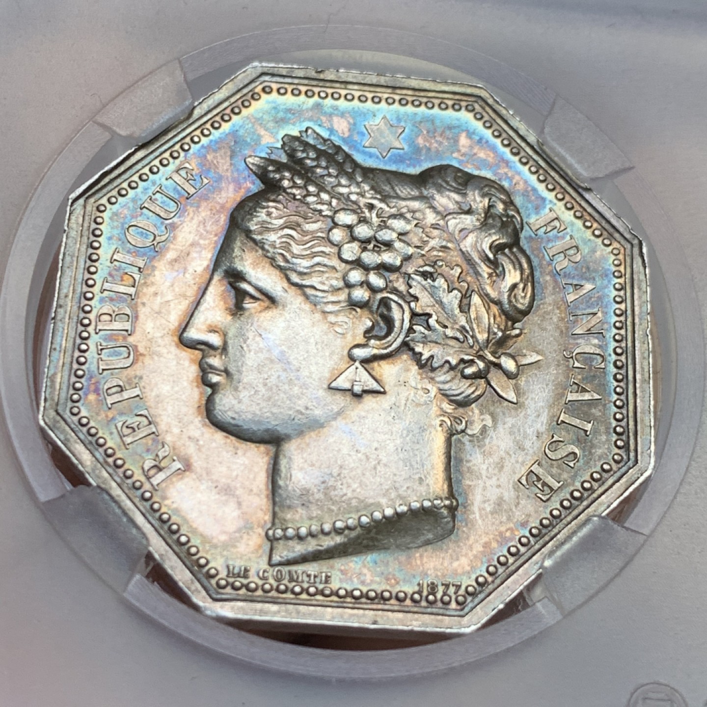 《竞宝斋》第143场-周日，周一 2场 (全场包邮) 法国 1880-1898 银质八角代币  鲁昂地区公证人 金紫包浆非常漂亮 个头很大 丰饶角边铭 22.3g 36.2mm