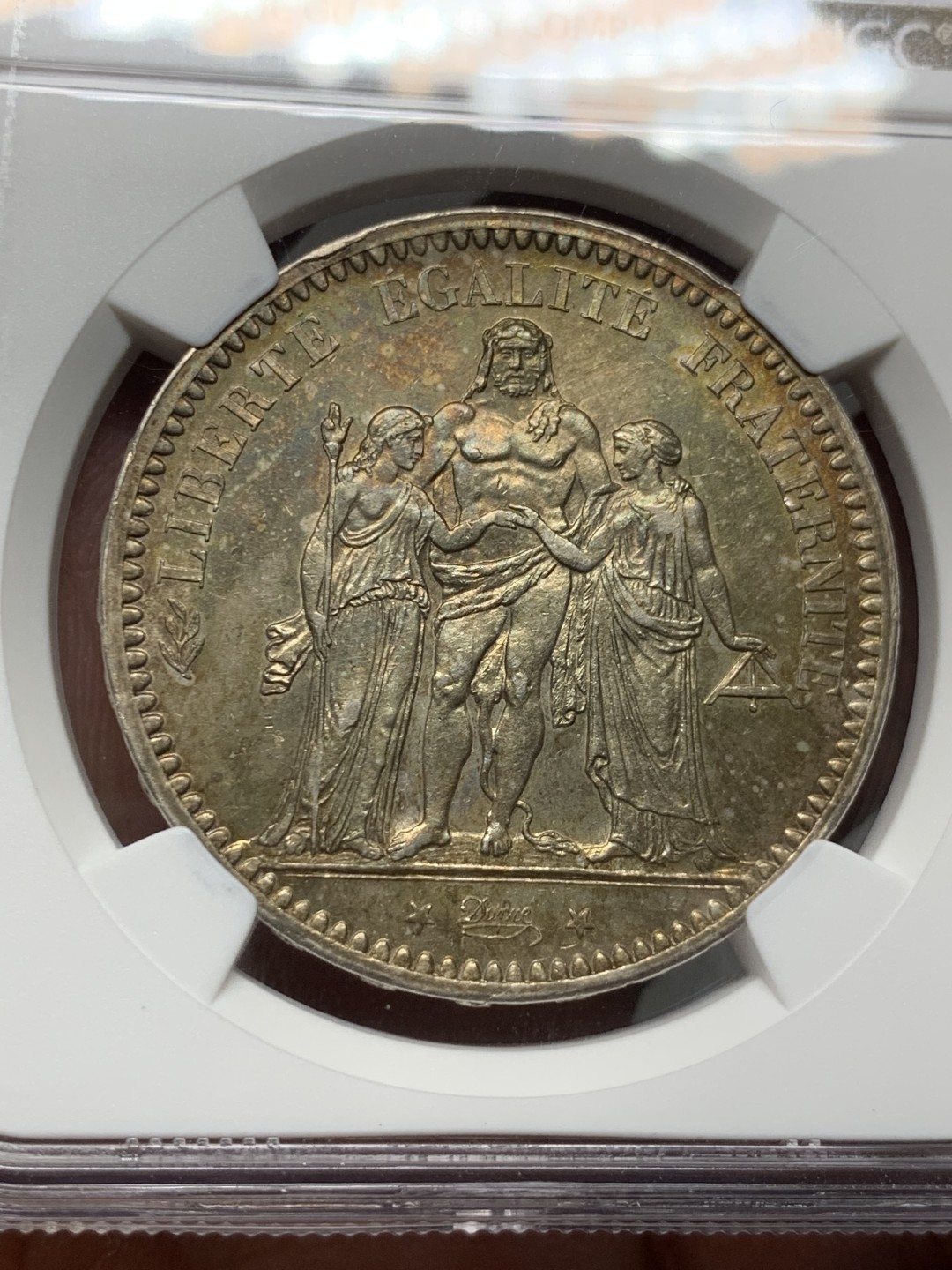 《竞宝斋》第143场-周日，周一 2场 (全场包邮) NGC UNC  法国 1873年 大力神银币 好品低评包浆漂亮 MS的既视感