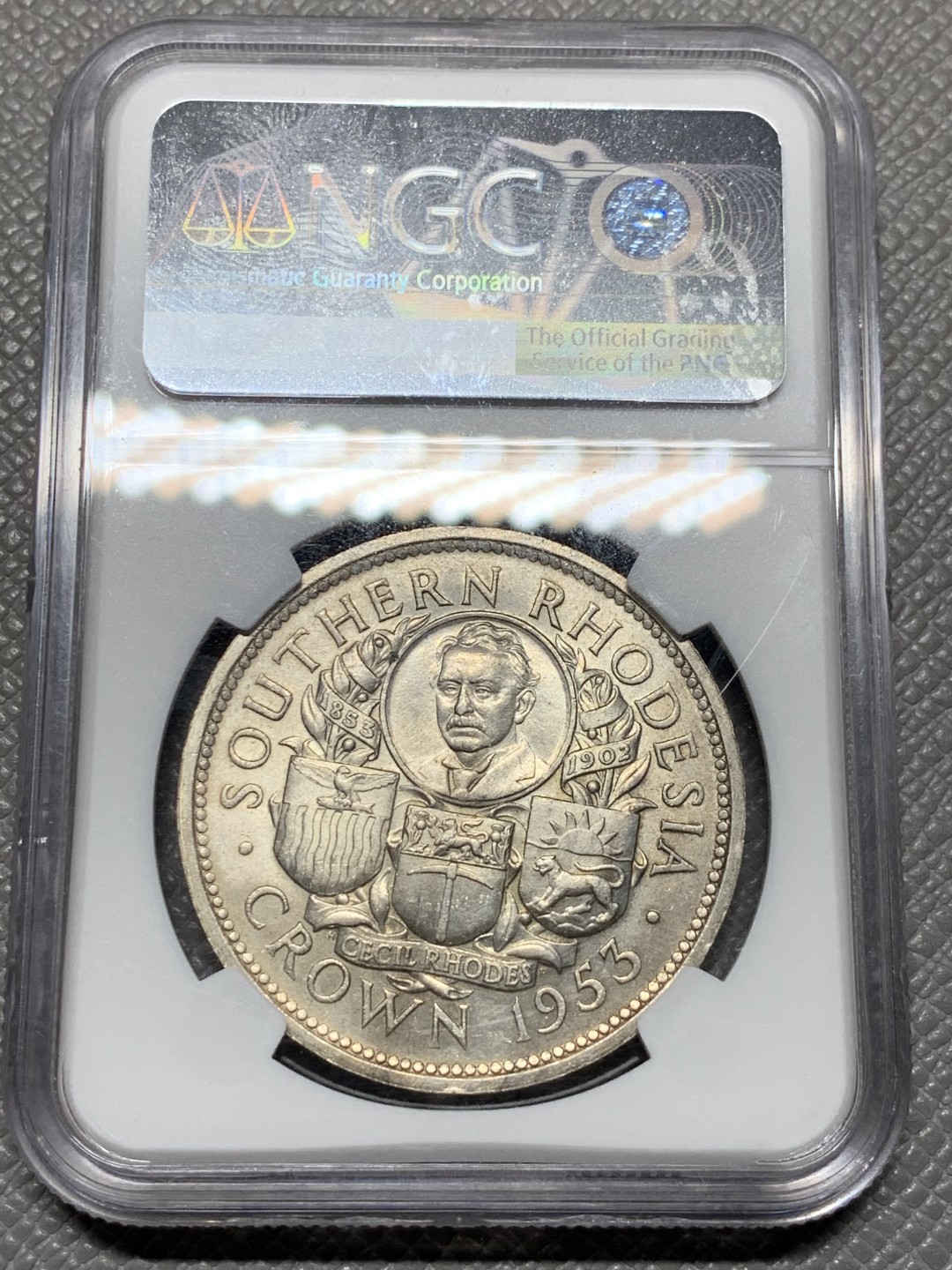 《竞宝斋》第143场-周日，周一 2场 (全场包邮) NGC  MS64 南罗德西亚1953年1克朗银币正面伊丽莎白二世女王背面殖民地头子伊安·史密斯发行的第一枚银币