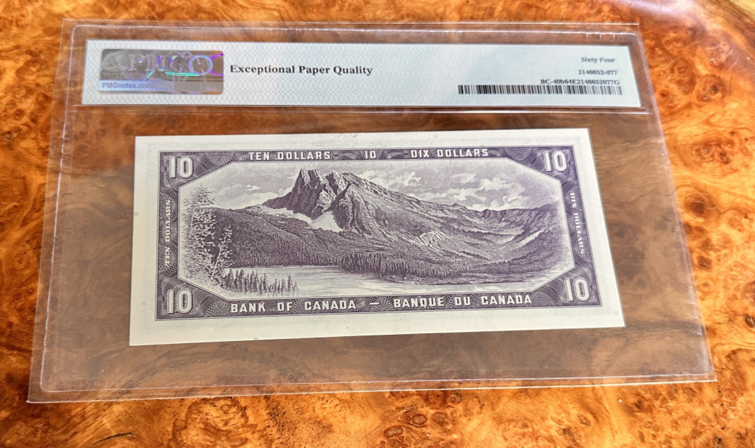 Chase Auction 第19期 - - 外钞、民国钞和人民币混合场！ 1954年加拿大10元，PMG64e，晚装女王，背面风景壮观！