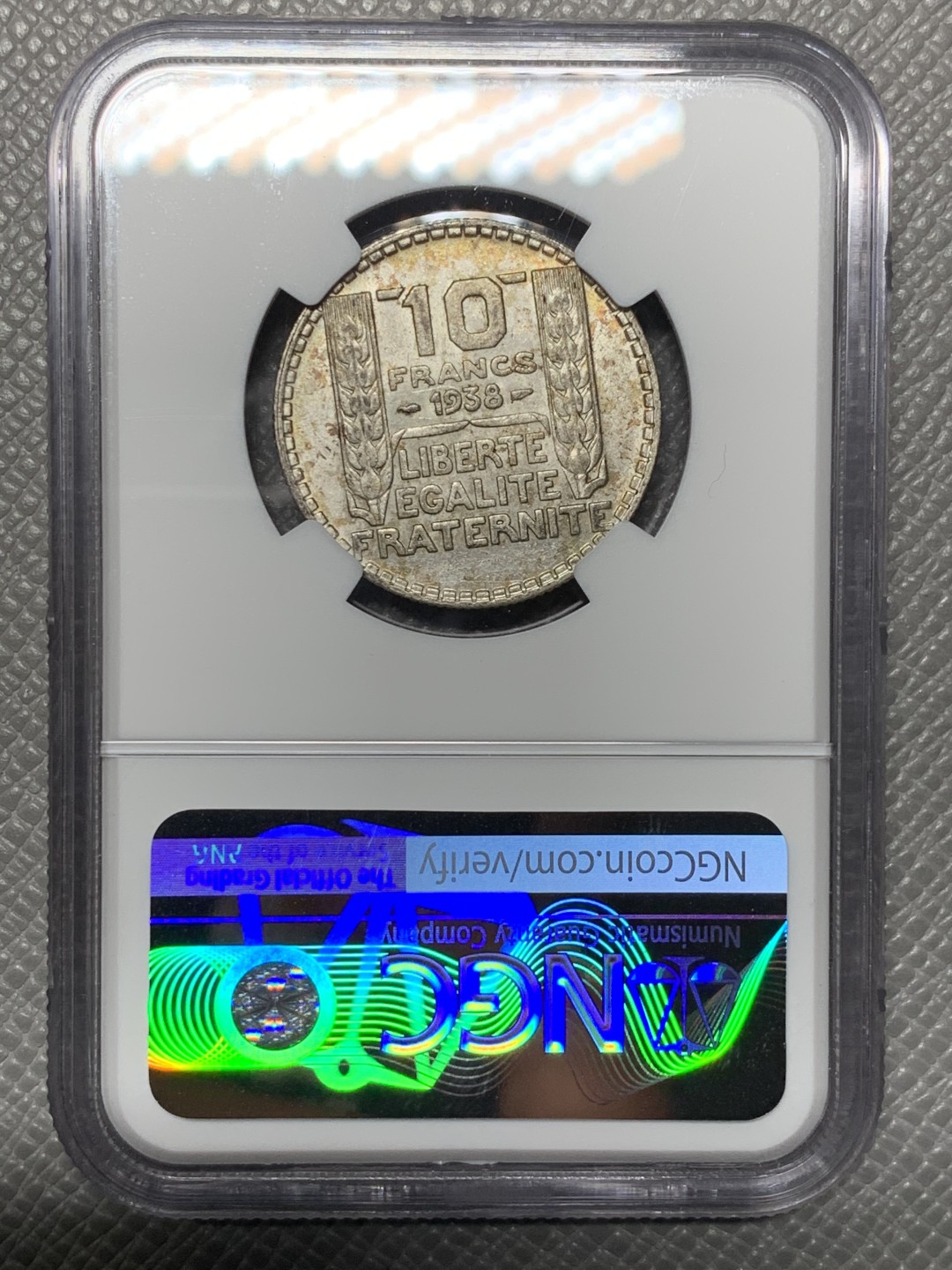 《竞宝斋》第143场-周日，周一 2场 (全场包邮) NGC-AU58 法国1938年 谷物女神10法郎银币 五彩包浆 低评