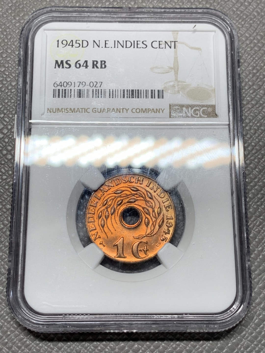 《竞宝斋》第143场-周日，周一 2场 (全场包邮) NGC-64RB 荷属东印度1945年D版1C铜币。原光卷拆品，十分精美