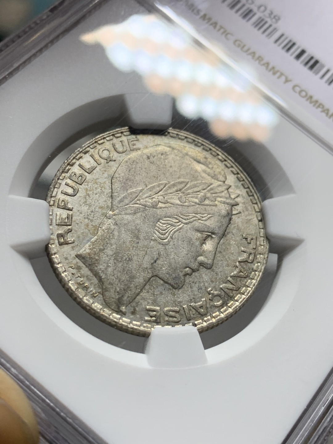 《竞宝斋》第143场-周日，周一 2场 (全场包邮) NGC-AU58 法国1938年 谷物女神10法郎银币 五彩包浆 低评