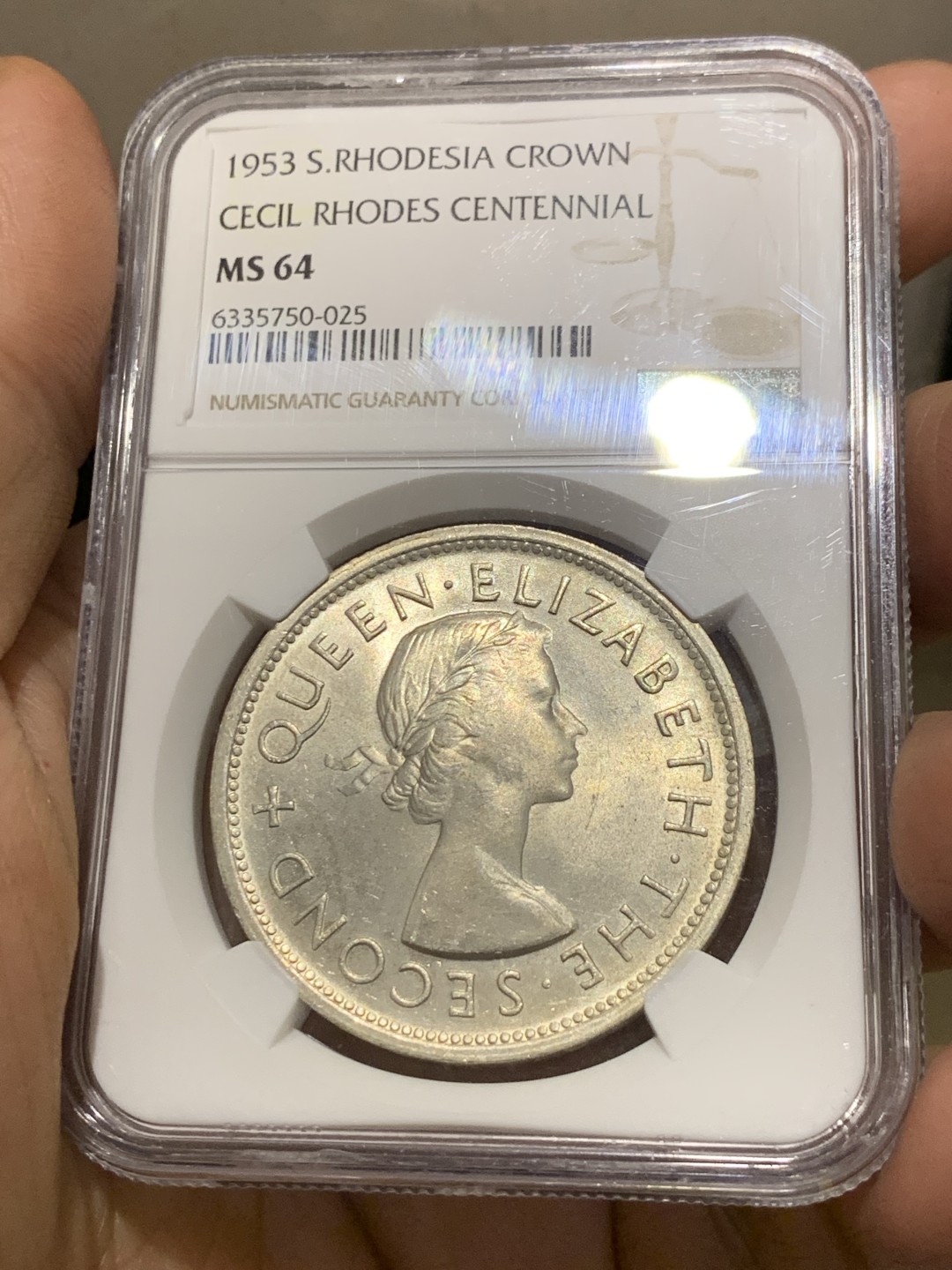 《竞宝斋》第143场-周日，周一 2场 (全场包邮) NGC  MS64 南罗德西亚1953年1克朗银币正面伊丽莎白二世女王背面殖民地头子伊安·史密斯发行的第一枚银币