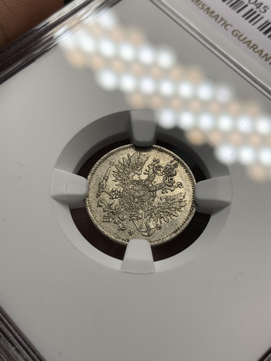 《竞宝斋》第143场-周日，周一 2场 (全场包邮) NGC-MS63 俄属芬兰1916年 双头鹰25分银币 细节一流非常漂亮