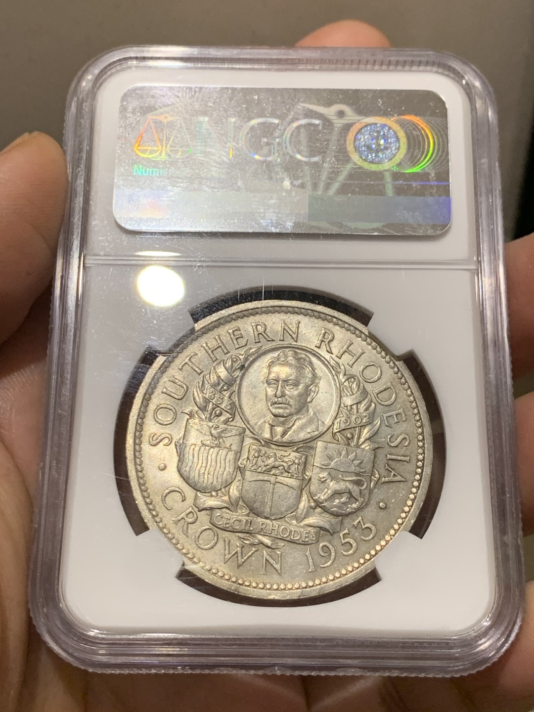 《竞宝斋》第143场-周日，周一 2场 (全场包邮) NGC  MS64 南罗德西亚1953年1克朗银币正面伊丽莎白二世女王背面殖民地头子伊安·史密斯发行的第一枚银币