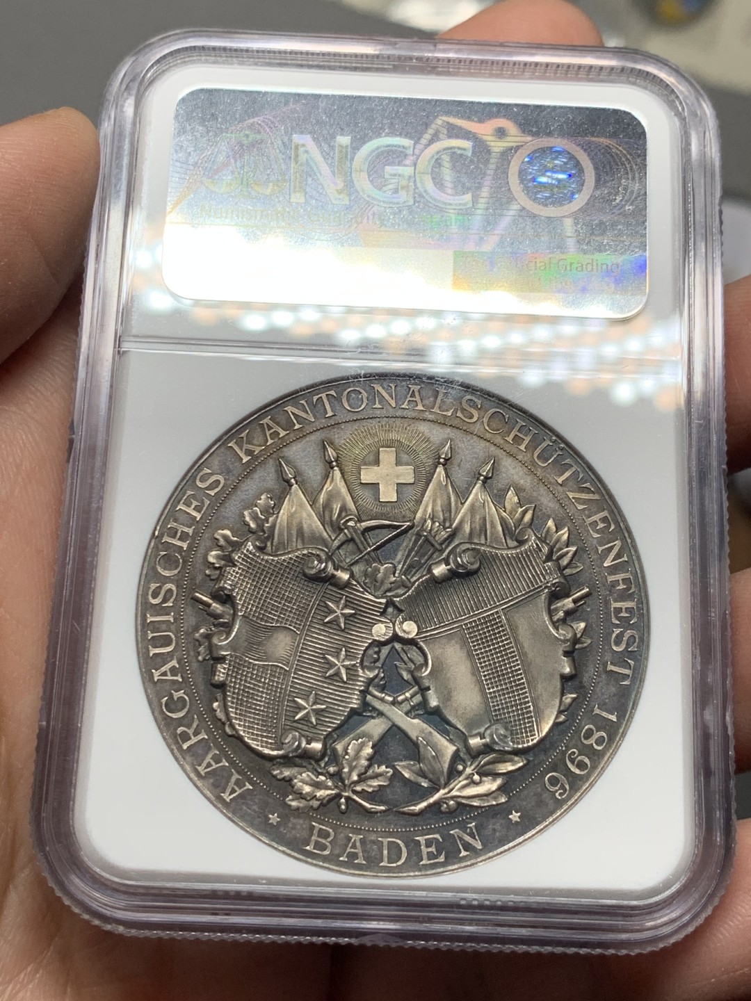 《竞宝斋》第143场-周日，周一 2场 (全场包邮) NGC MS63 1896年 瑞三阿尔高射击节银章 稀少热门品种 镜面底板 高分品质 高点俱在,近乎完美,收藏一步到位