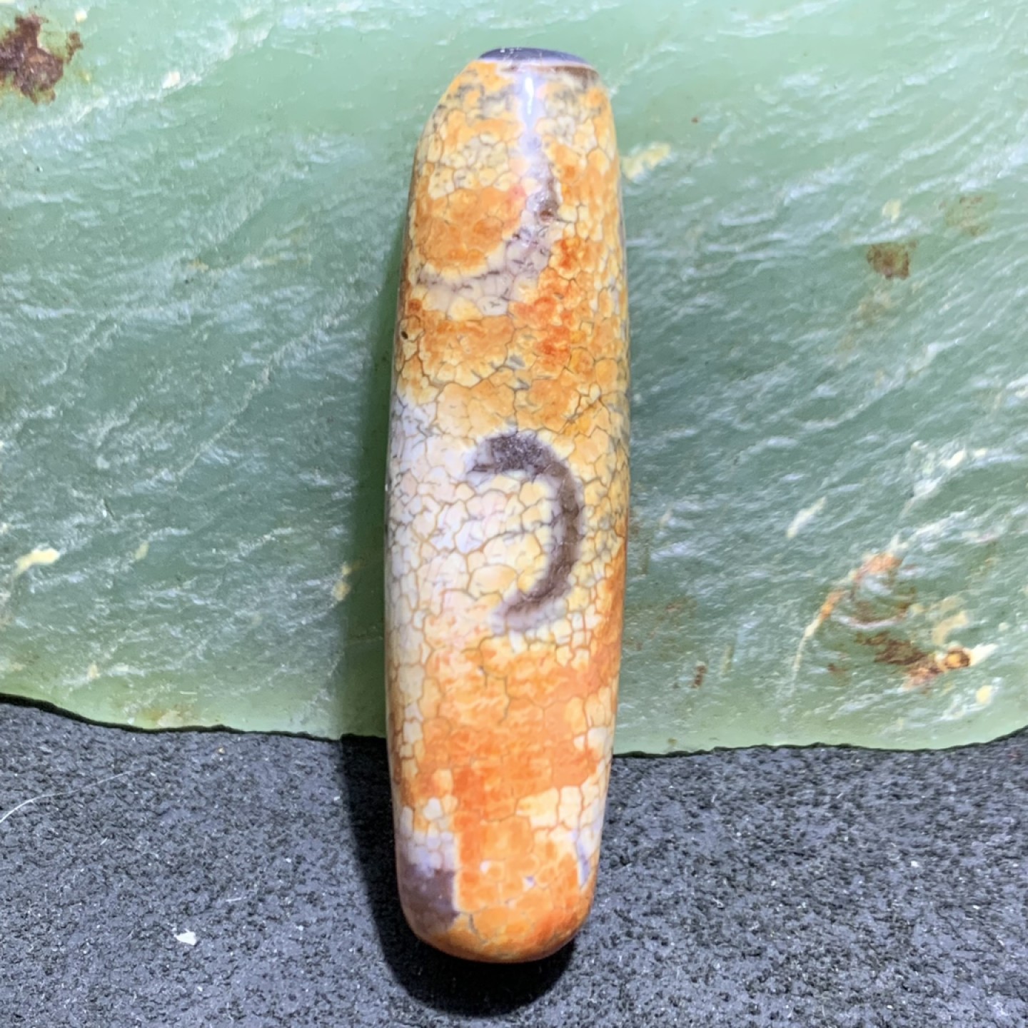 精美火贡皮仿古玛瑙桶珠一个