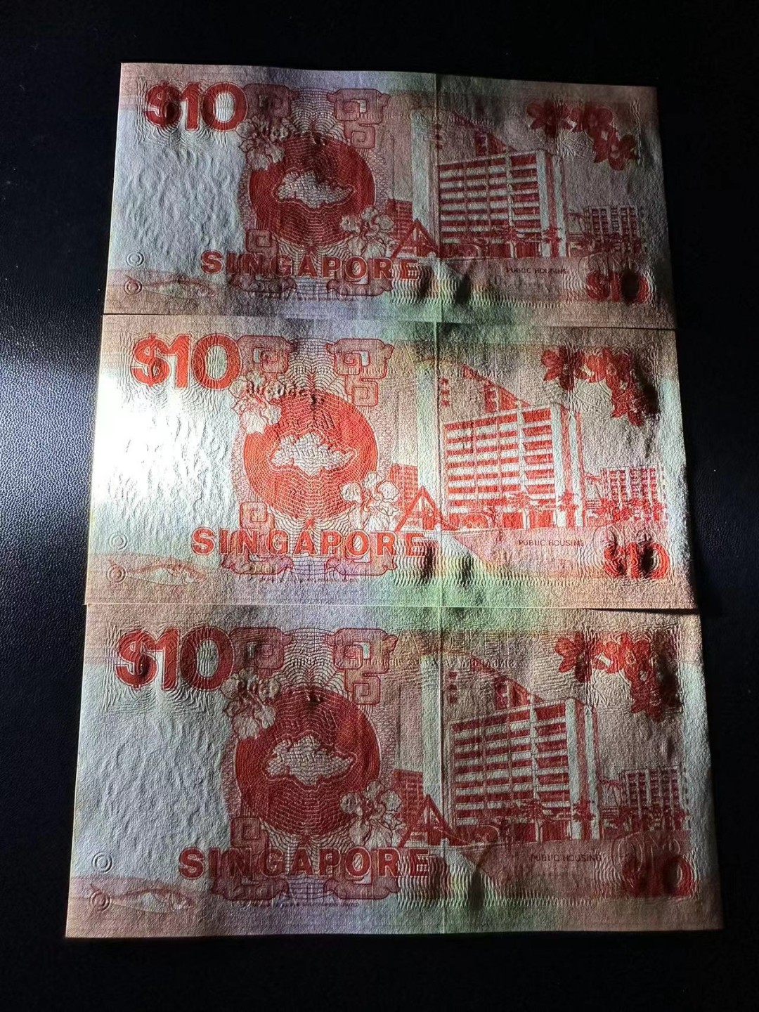 《外钞收藏家》第二百五十一期 新加坡船版10元 连号3张 全新 有受潮