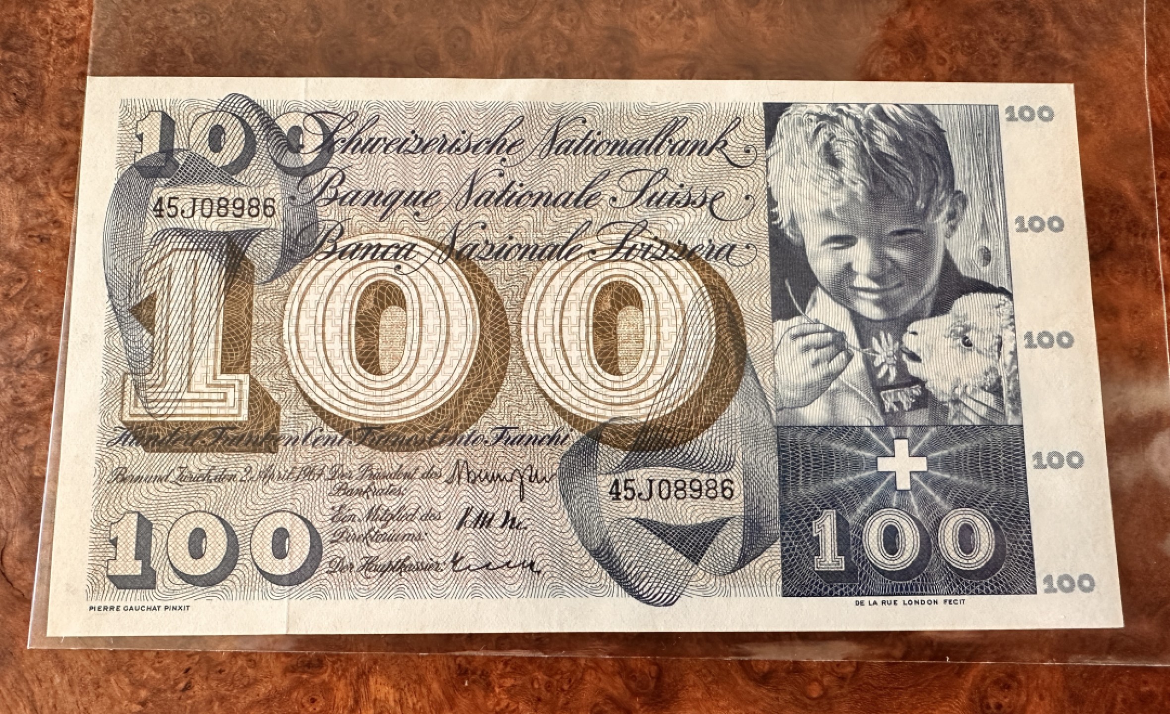Chase Auction 第19期 - - 外钞、民国钞和人民币混合场！ 瑞士100法郎，圣马丁割袍，品相如图，UNC-，背面上方有轻微压痕，倒置号！