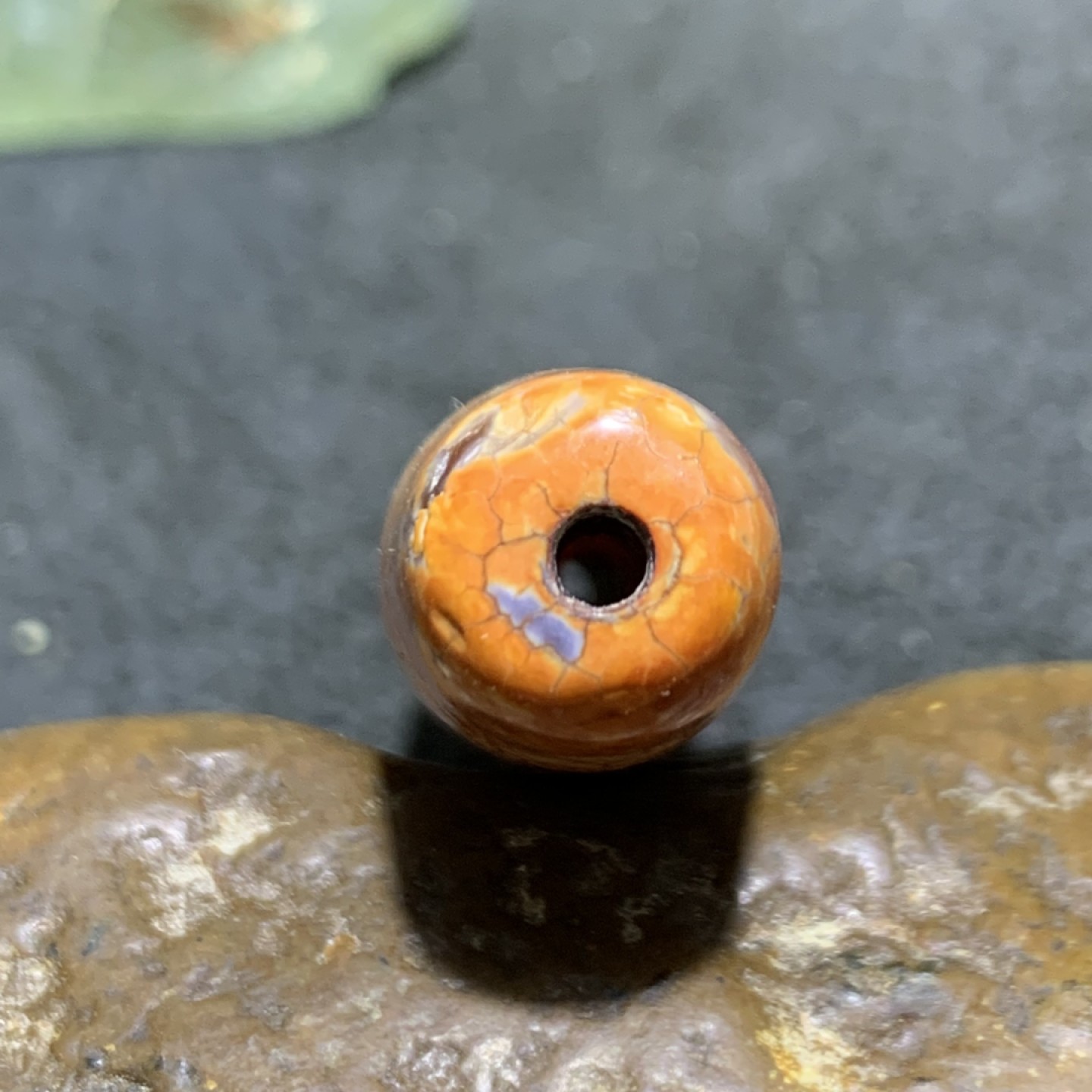 精美火贡皮仿古玛瑙桶珠一个