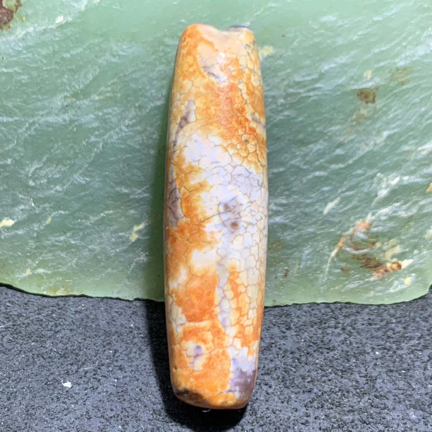 精美火贡皮仿古玛瑙桶珠一个