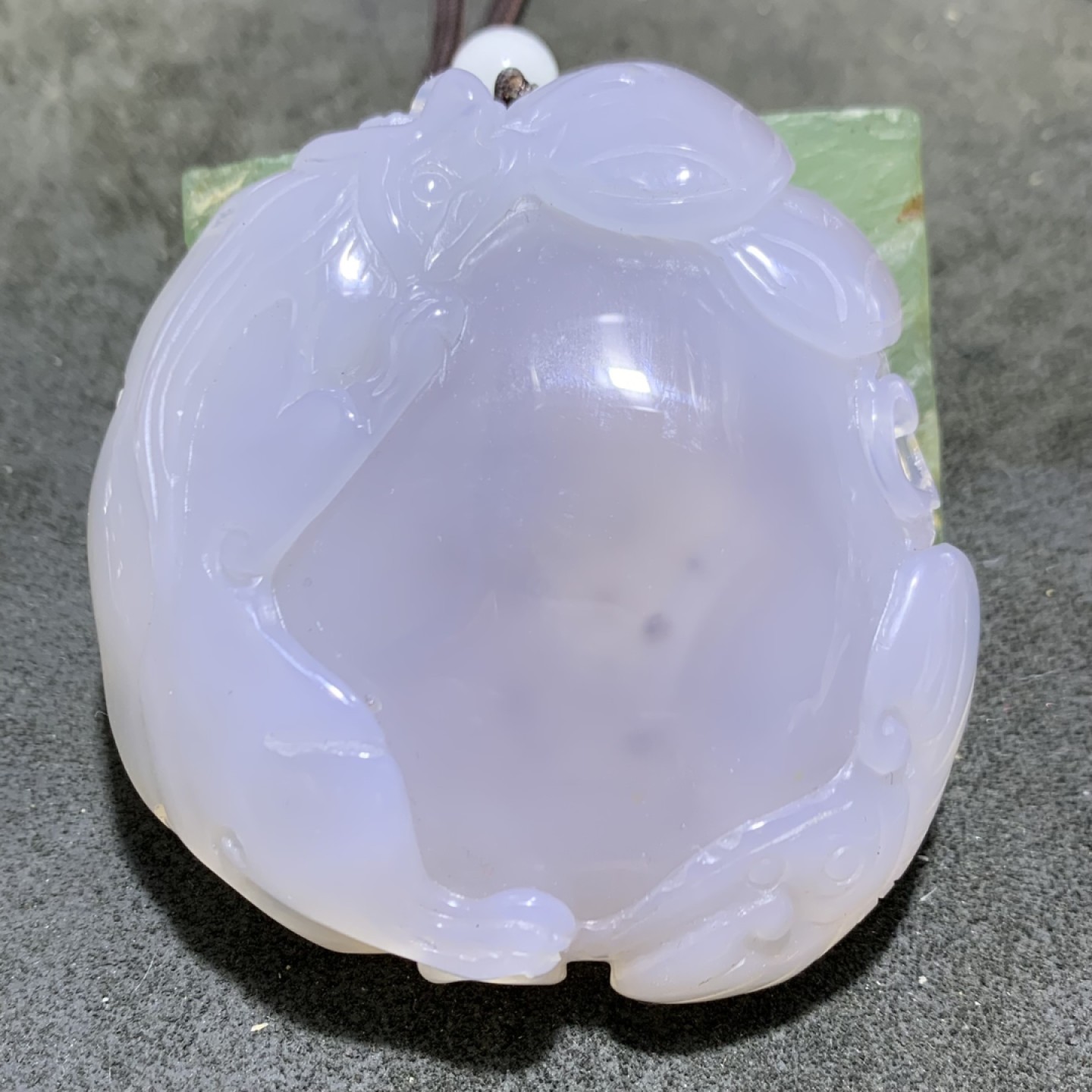 精美天然水胆玛瑙原石雕刻瑞兽送财把件一个，