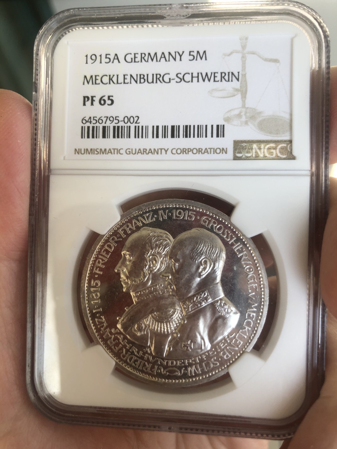 博洋堂世界钱币拍卖第019期（全场包邮） NGC PR65 1915年德国梅克伦堡-什未林大公国5马克大银币  铸造量仅1万枚，稀有品种，底板好，收藏级，由于该品种发行时德国正处进行一战时期，政府原计划铸造2万枚该品种5马克的结果因多种原因而实际只铸造了近1万枚。