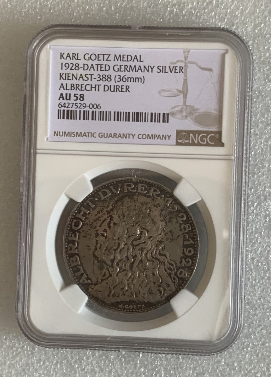 瓶子🏺第83期拍卖会 德国1928年卡尔哥茨天使银章NGC AU58五彩好状态低评