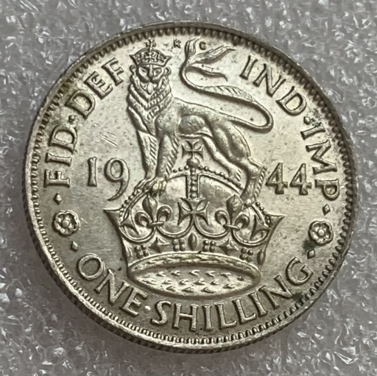 瓶子🏺第83期拍卖会 1944年英国乔治六世1先令狮子银币