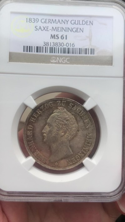 博洋堂世界钱币拍卖第019期（全场包邮） NGC MS61 1839年德国萨克森-迈宁根公国1盾  此枚NGC冠军分  该品种流通充分，铸造量少好品存世量更稀少，这枚正面有点PL，欧洲纸袋五彩包浆