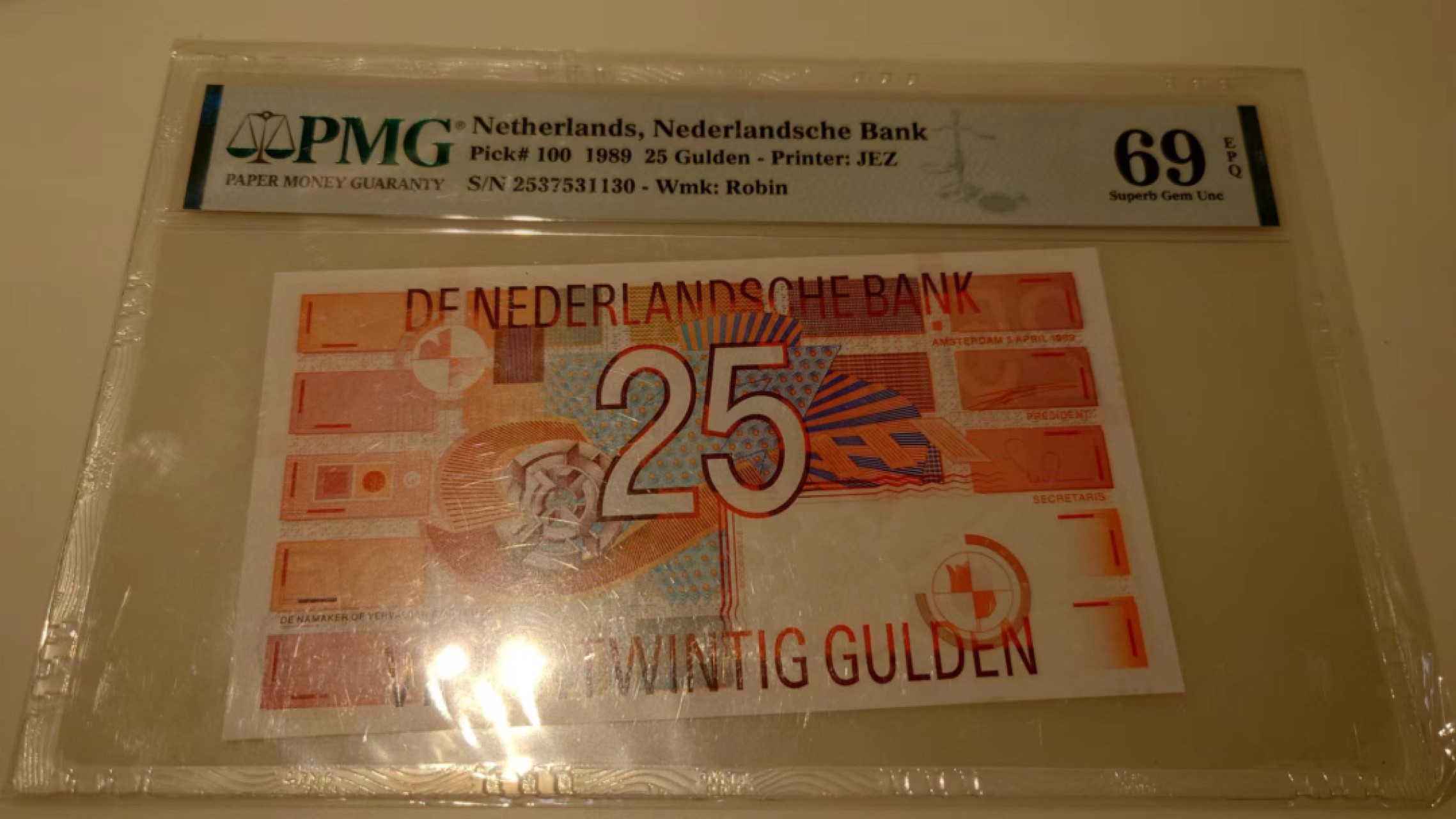 【世界钱币】精选微拍第56期暨2023年第三期  评级币专场 1989年荷兰25盾 PM69E高分 全新UNC无4尾号1130