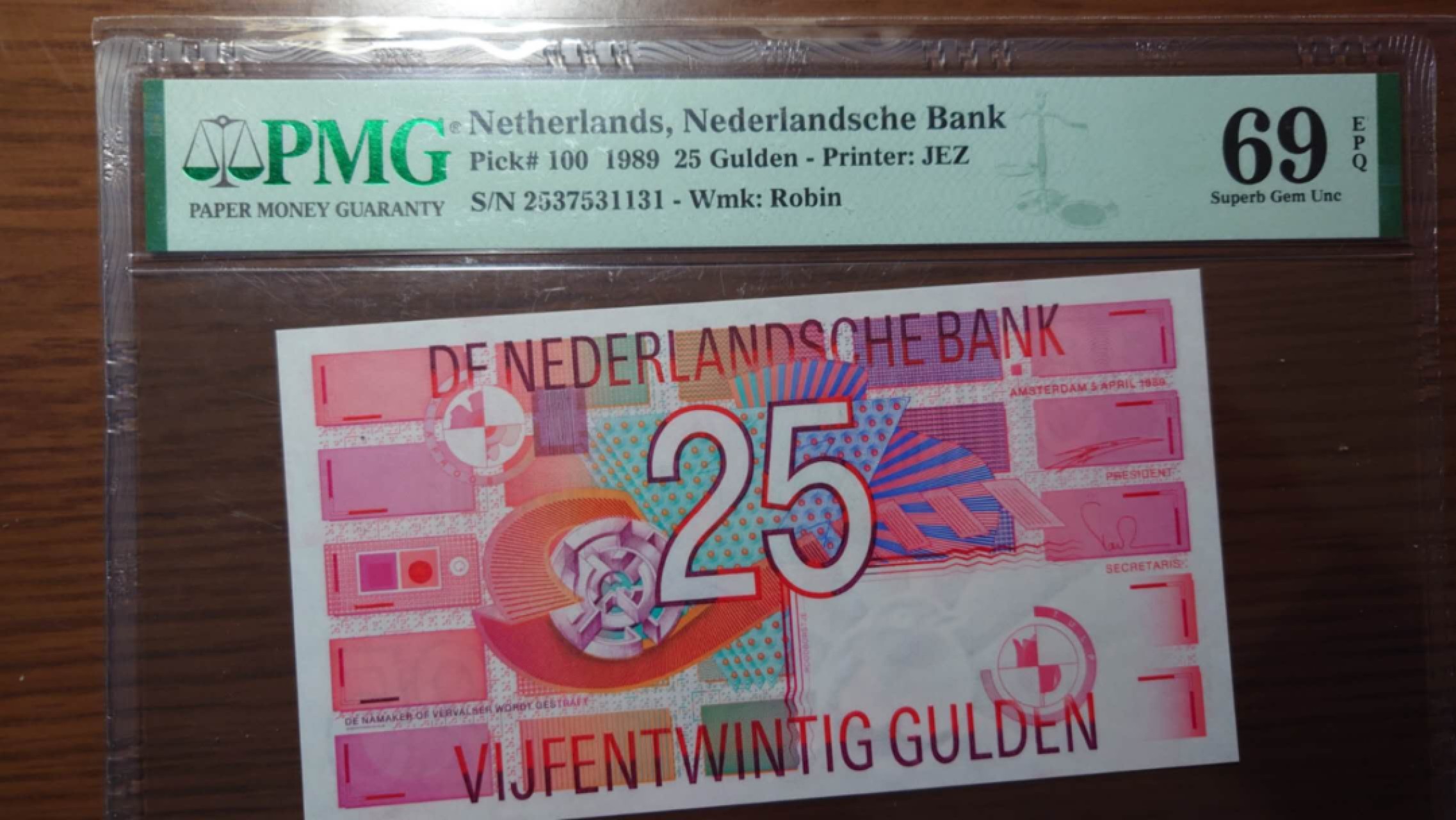 【世界钱币】精选微拍第56期暨2023年第三期  评级币专场 1989年荷兰25盾 PM69E高分 全新UNC无4尾号1131