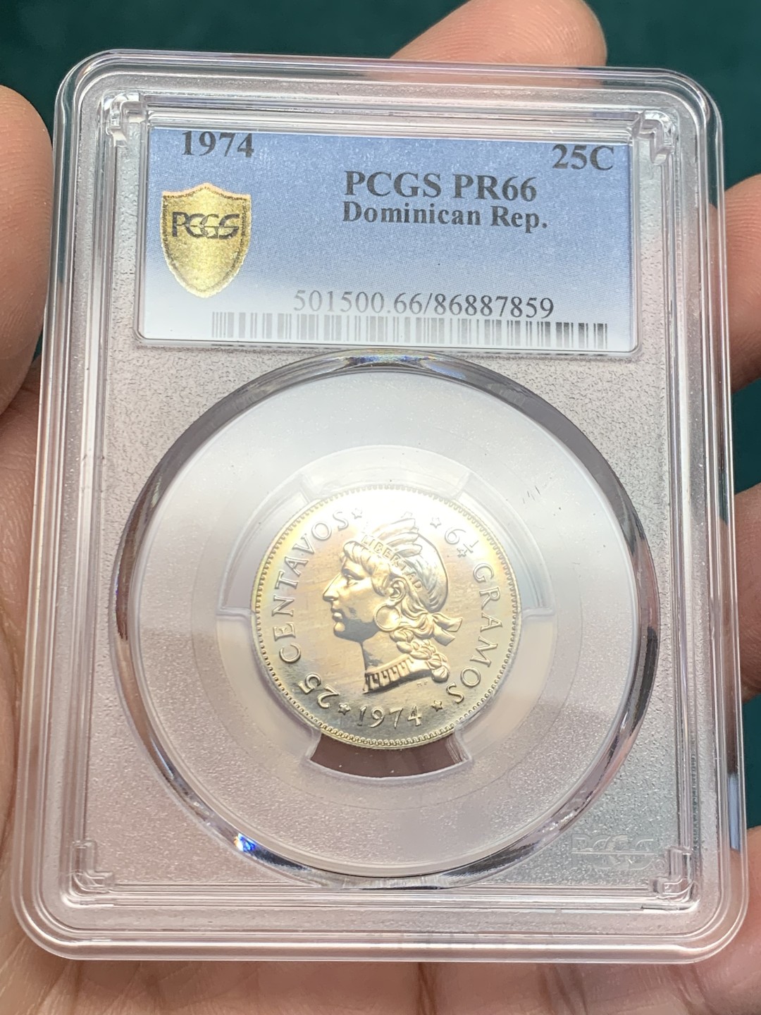 《竞宝斋》第146场-周日，周一 2场 (全场包邮) PCGS评级PR66，1974年多米尼加精制25分铜镍币，铸量仅500，稀见精制版流通币，当年最大面值流通币，五彩包浆未养护原状态。