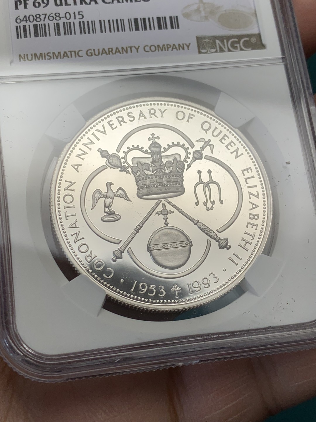 《竞宝斋》第146场-周日，周一 2场 (全场包邮) NGC-PF69 开曼群岛1993年 女王加冕四十周年纪念 精制大银币 稀少