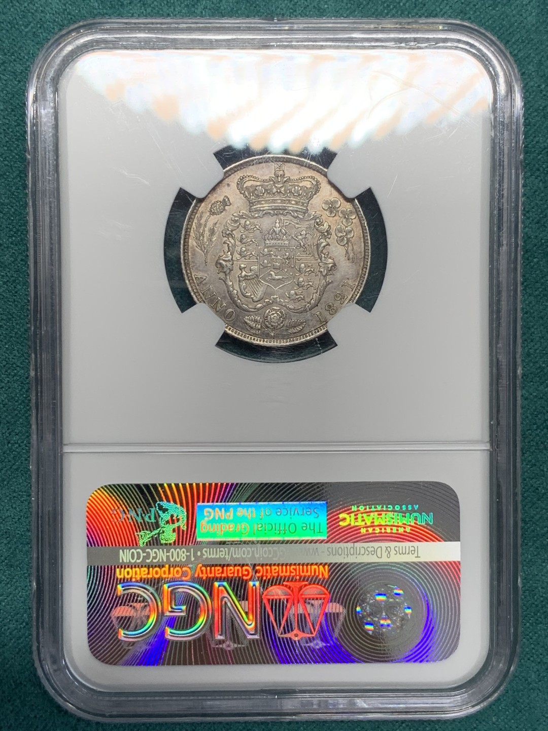 《竞宝斋》第146场-周日，周一 2场 (全场包邮) NGC-AU55 英国 1821年乔治四世三花版1先令银币 著名单年版本，漂亮的三花。实物转光，状态很好，给分略显保守