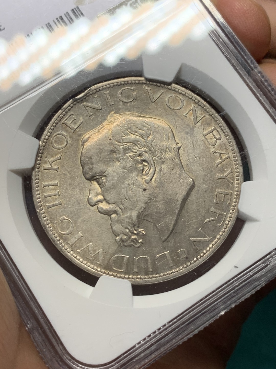 《竞宝斋》第146场-周日，周一 2场 (全场包邮) NGC-UNCD 德国1914年 巴伐利亚5马克银币 带淡包浆和转光，可惜正面上方有小磕ngc不给分