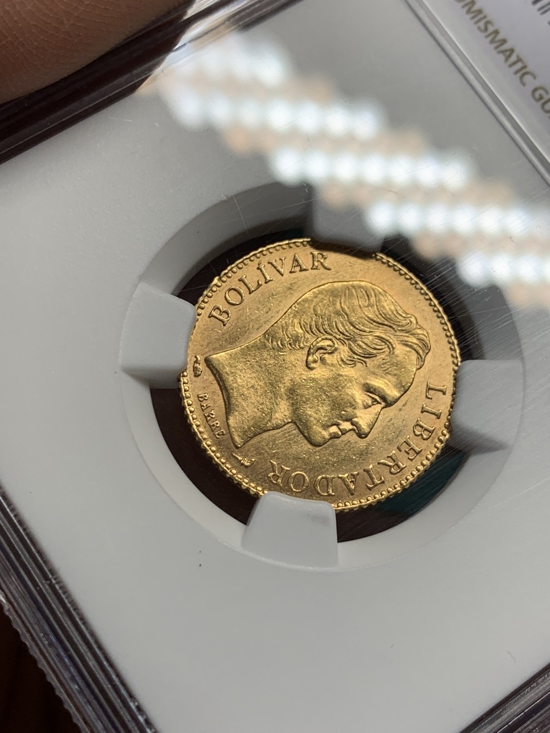 《竞宝斋》第146场-周日，周一 2场 (全场包邮) NGC-MS63 委内瑞拉1911年 20玻利瓦尔金币 顶级品相