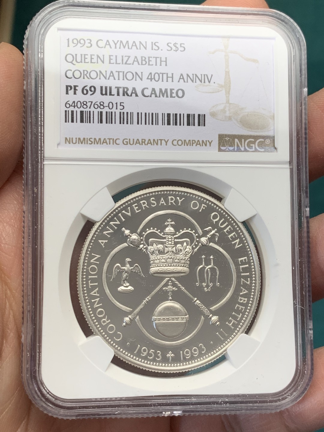 《竞宝斋》第146场-周日，周一 2场 (全场包邮) NGC-PF69 开曼群岛1993年 女王加冕四十周年纪念 精制大银币 稀少