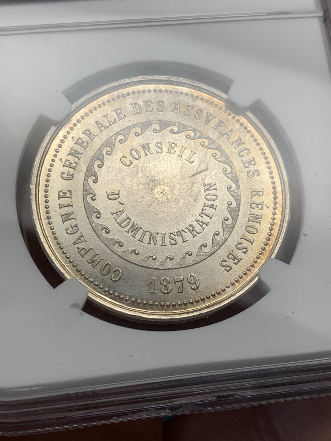 《竞宝斋》第146场-周日，周一 2场 (全场包邮) NGC MS64 1879年法国拉雷莫瓦兹保险银质 圆形代币 顶级品相状态