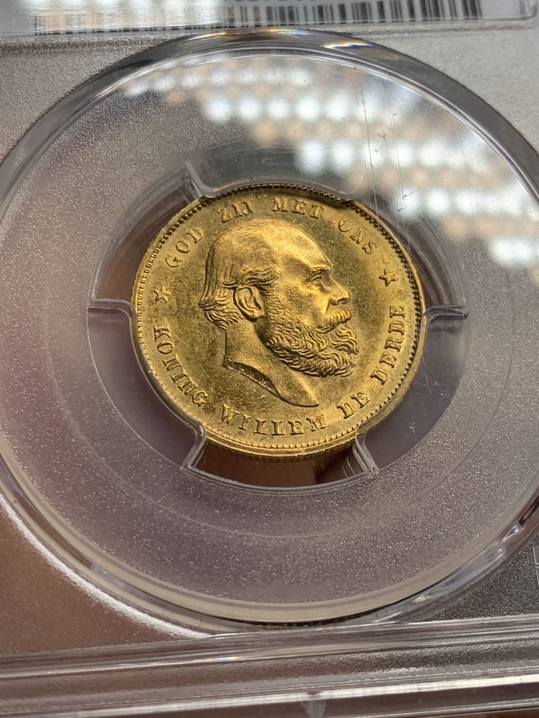 《竞宝斋》第146场-周日，周一 2场 (全场包邮) PCGS-MS63 荷兰王国 尼德兰荷兰 1877年 威廉二世 10盾金币，转光明显 性价比高的好品金币