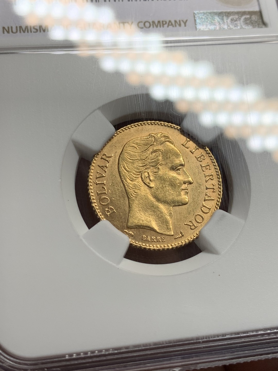 《竞宝斋》第146场-周日，周一 2场 (全场包邮) NGC-MS63 委内瑞拉1911年 20玻利瓦尔金币 顶级品相