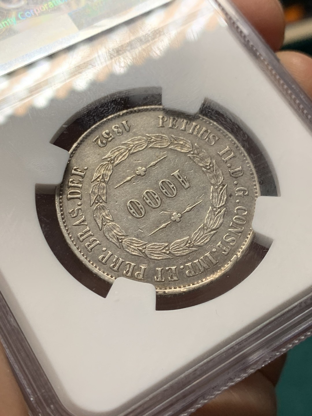 《竞宝斋》第146场-周日，周一 2场 (全场包邮) NGC-XF 1852巴西1000里亚尔银币，大叶版