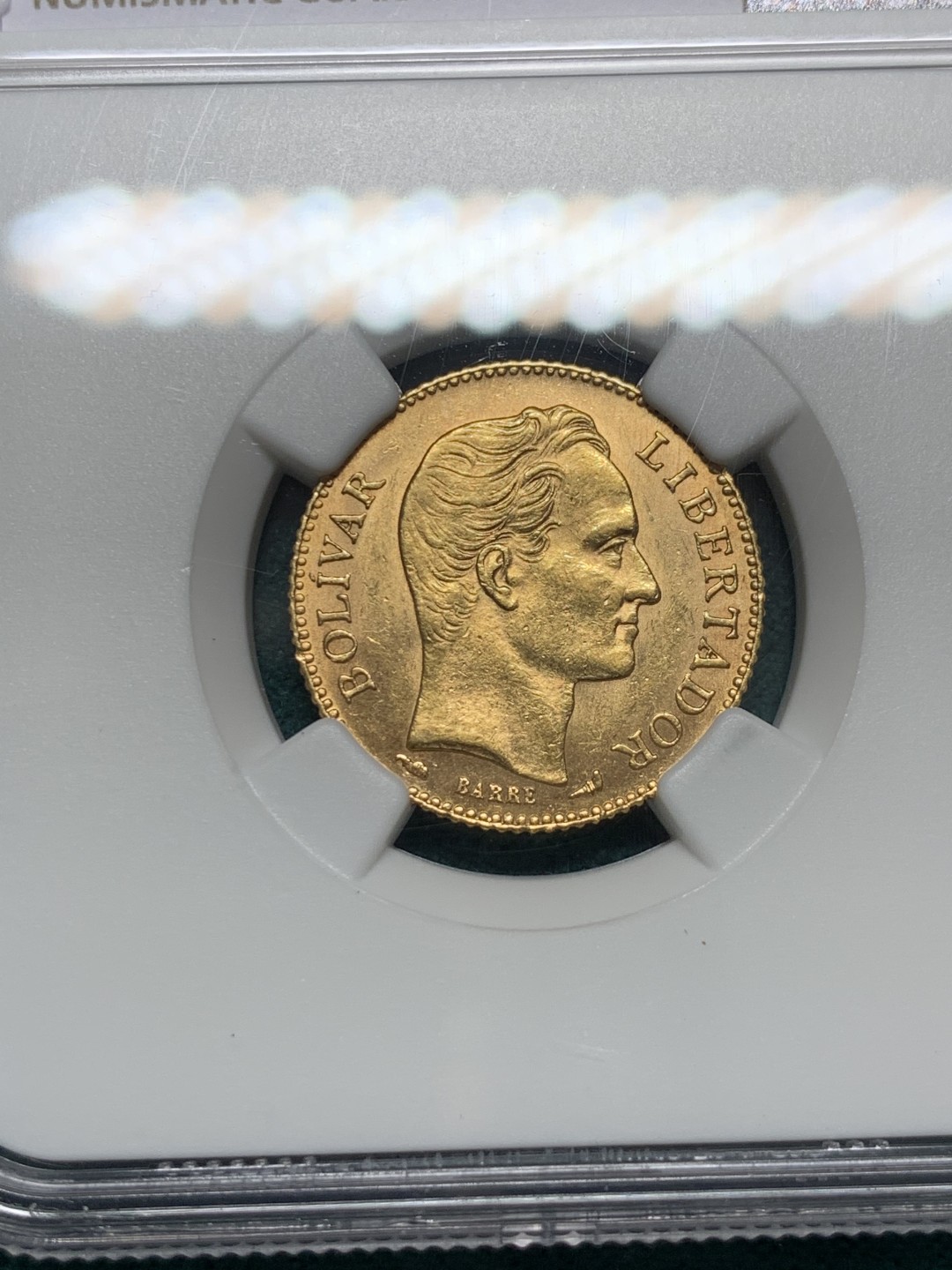 《竞宝斋》第146场-周日，周一 2场 (全场包邮) NGC-MS63 委内瑞拉1911年 20玻利瓦尔金币 顶级品相