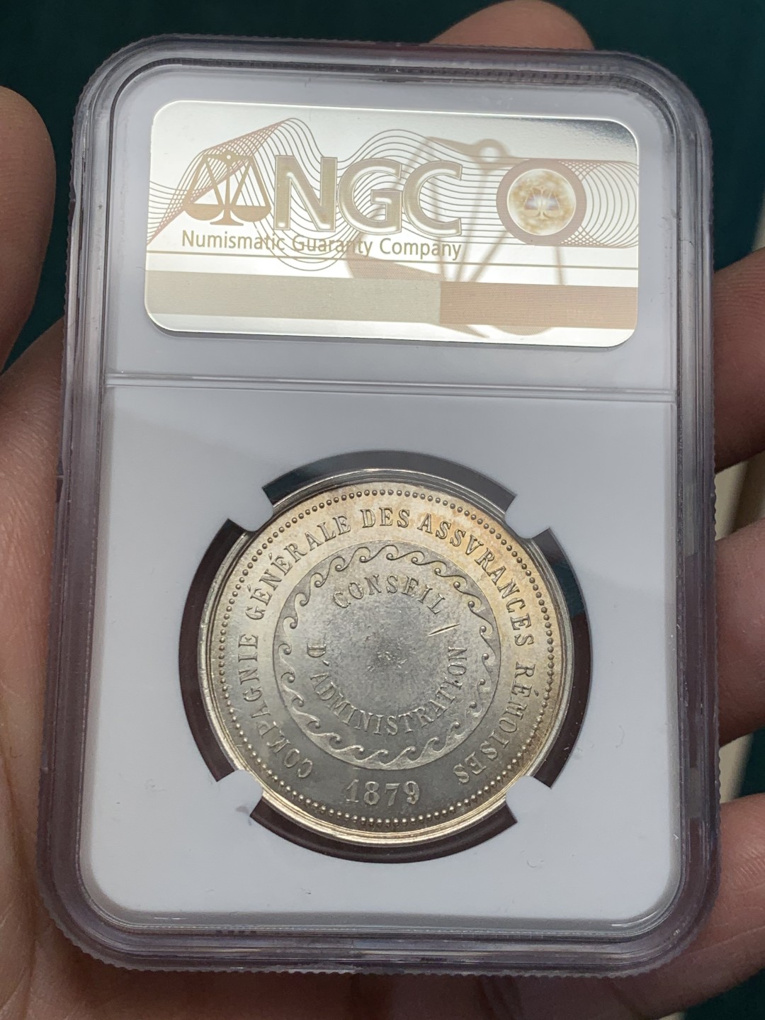 《竞宝斋》第146场-周日，周一 2场 (全场包邮) NGC MS64 1879年法国拉雷莫瓦兹保险银质 圆形代币 顶级品相状态
