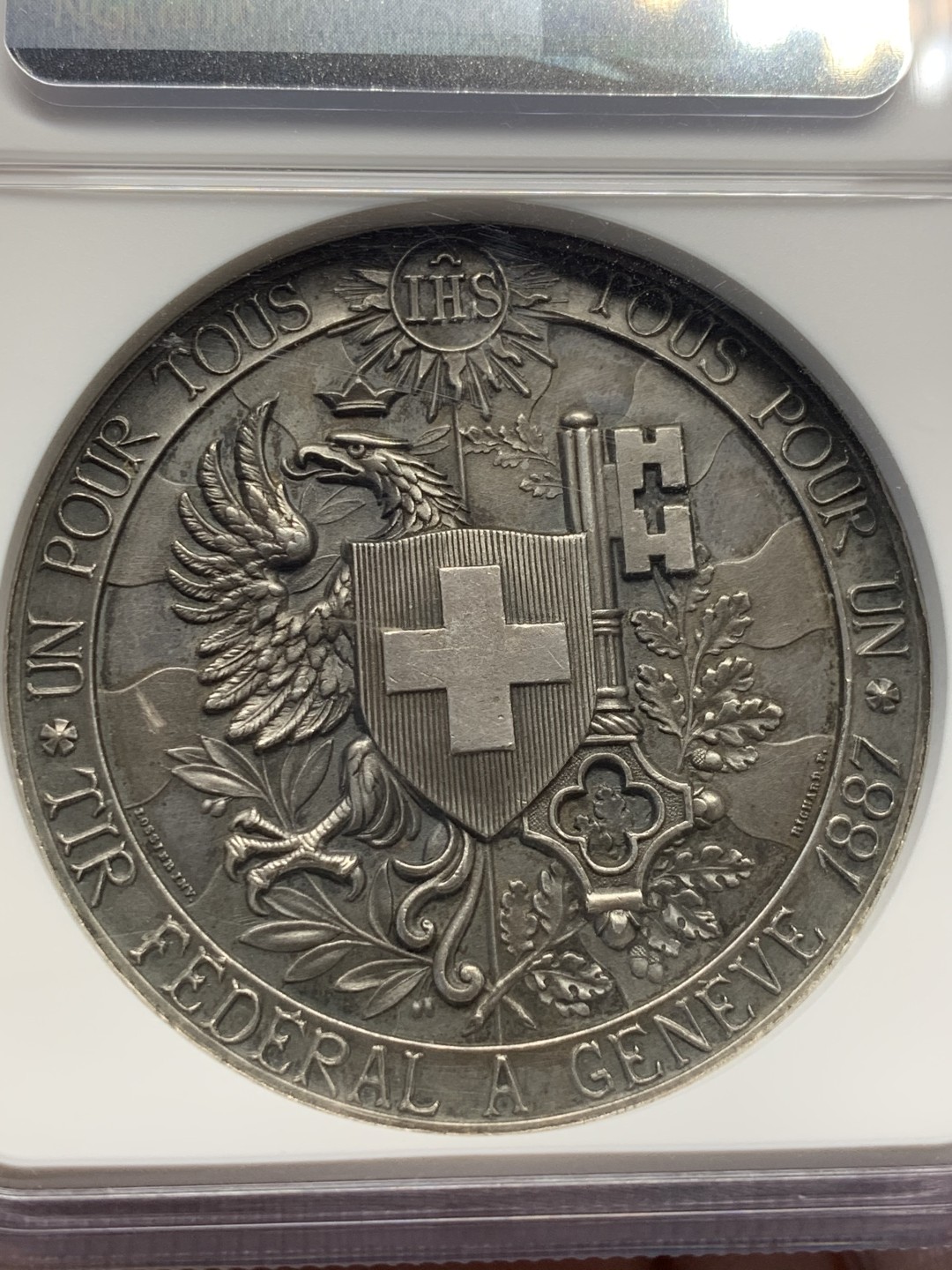 《竞宝斋》第146场-周日，周一 2场 (全场包邮) NGC-MS63 瑞士 1887年 日内瓦射击节 银章 人像立体高浮雕工艺