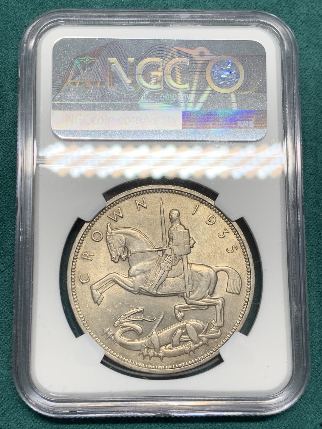 《竞宝斋》第146场-周日，周一 2场 (全场包邮) NGC-MS63 英国1935年乔五木马剑克朗银币，转光强烈，打制深峻，无明显瑕疵