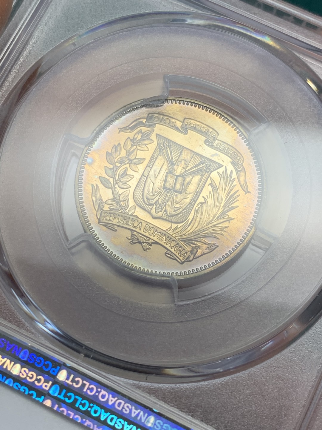 《竞宝斋》第146场-周日，周一 2场 (全场包邮) PCGS评级PR66，1974年多米尼加精制25分铜镍币，铸量仅500，稀见精制版流通币，当年最大面值流通币，五彩包浆未养护原状态。