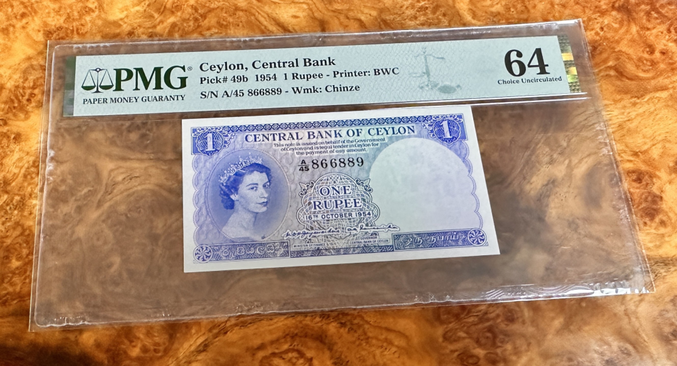 Chase Auction 第20期 - - 外钞、民国钞和人民币混合场！ 1954年锡兰1卢比，PMG64，大冠女王，倒置号，圆圆号！