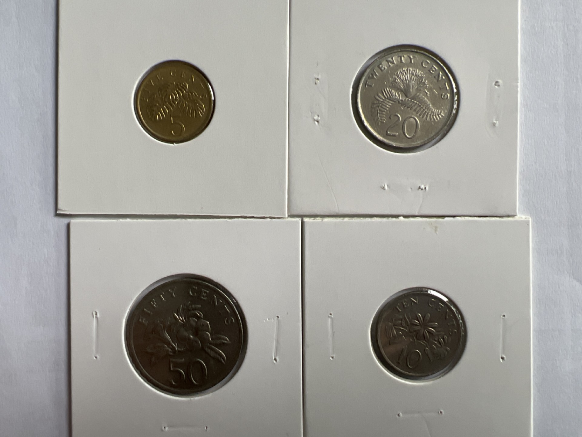 泡泡堂微拍第一 一〇幕硬币捡漏可累计专场👿👿，累计满二十元包邮，接受代拍业务 新加坡1985年4枚