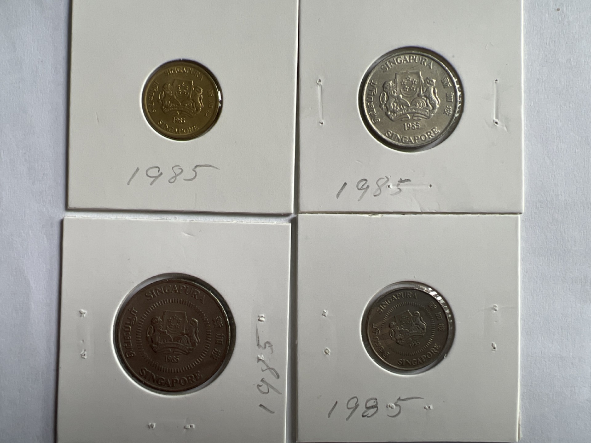 泡泡堂微拍第一 一〇幕硬币捡漏可累计专场👿👿，累计满二十元包邮，接受代拍业务 新加坡1985年4枚