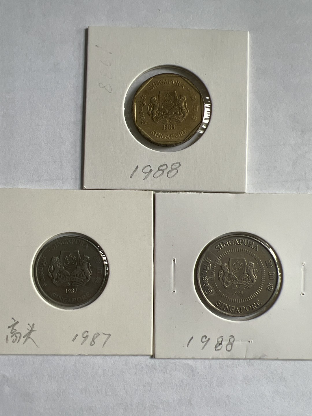 泡泡堂微拍第一 一 一幕硬币捡漏可累计专场👿👿，累计满二十元包邮，接受代拍业务 新加坡三枚