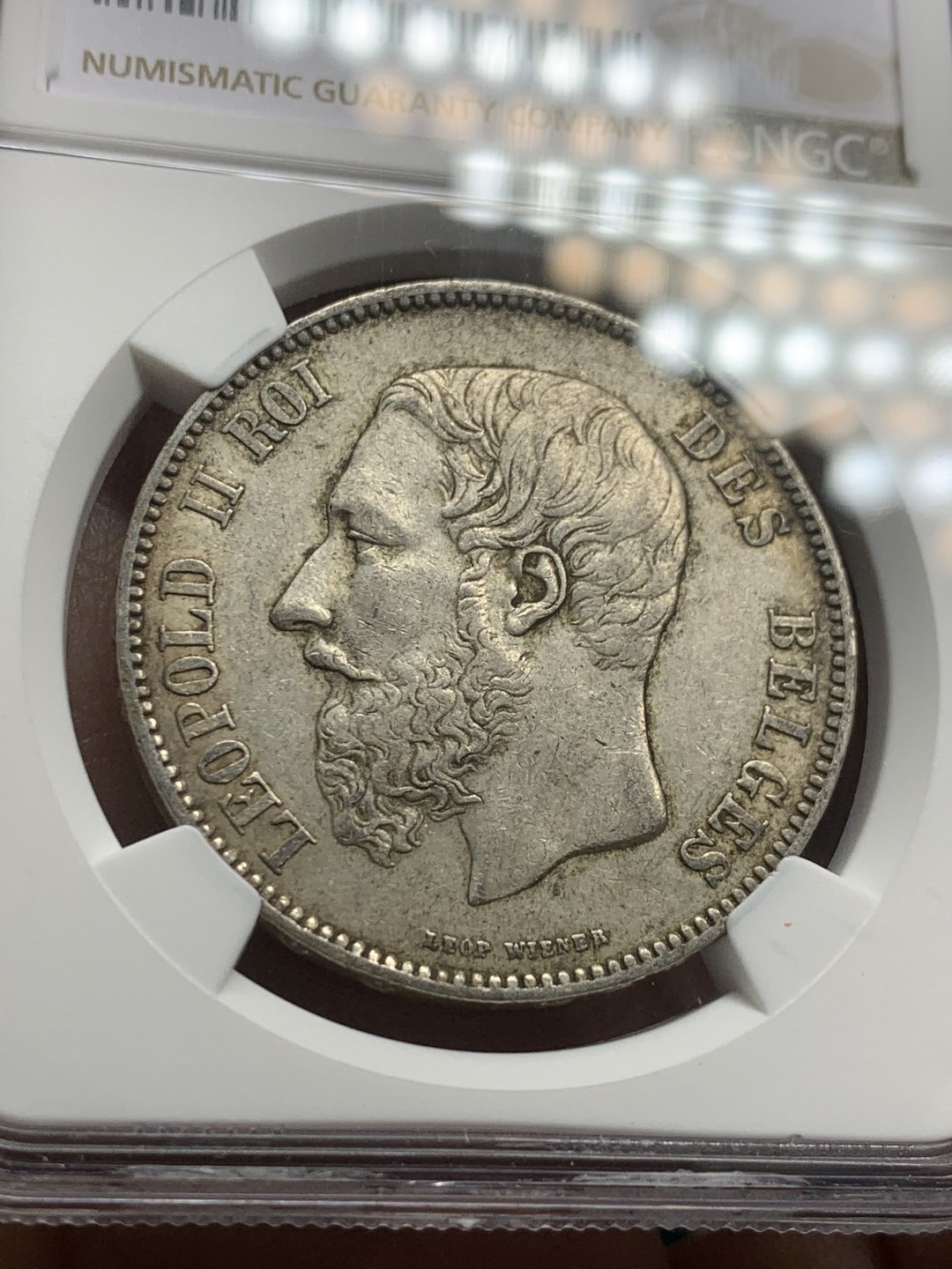 《竞宝斋》第147场-周日，周一 2场 (全场包邮) NGC AUD 比利时 1873年 利奥波德二世 5法郎银币 原味包浆 没有清洗痕迹