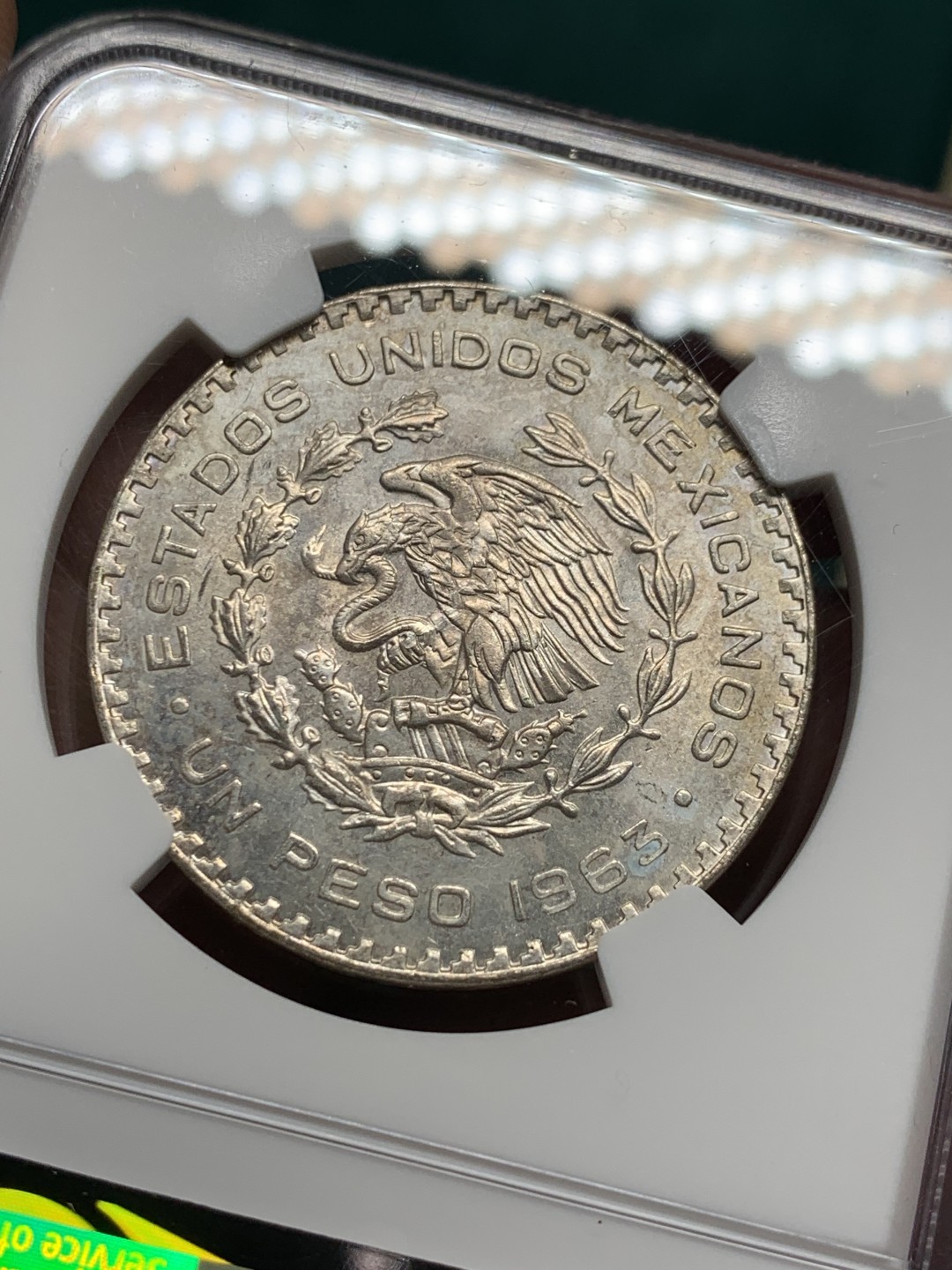 《竞宝斋》第147场-周日，周一 2场 (全场包邮) NGC-MS62 墨西哥1963年 小鹰洋1比索银币 原光好品 淡彩