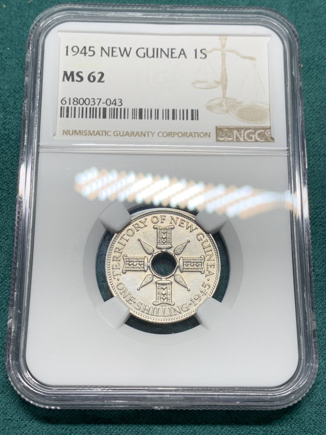 《竞宝斋》第147场-周日，周一 2场 (全场包邮) NGC MS62 1945新几内亚乔六1先令银币